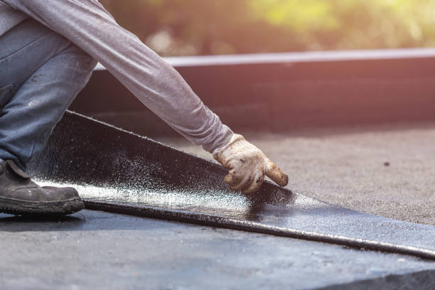 Professional Basement Waterproofing technician working in Akron, IN